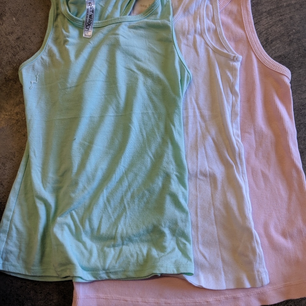 3 tank tops 1 a medium 1 a 12 the other a 1